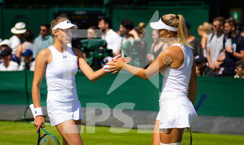 2022-07-01 - Dalma Galfi of Hungary & Dayana Yastremska of Ukraine in action during the second round of doubles at the 2022 Wimbledon Championships, Grand Slam tennis tournament on July 1, 2022 at All England Lawn Tennis Club in Wimbledon near London, England - TENNIS - WIMBLEDON 2022 - INTERNATIONALS - TENNIS