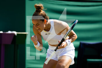 2022-07-01 - Maria Sakkari of Greece in action against Tatjana Maria of Germany during the third round of the 2022 Wimbledon Championships, Grand Slam tennis tournament on July 1, 2022 at All England Lawn Tennis Club in Wimbledon near London, England - TENNIS - WIMBLEDON 2022 - INTERNATIONALS - TENNIS