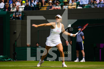 2022-07-01 - Angelique Kerber of Germany in action against Elise Mertens of Belgium during the third round of the 2022 Wimbledon Championships, Grand Slam tennis tournament on July 1, 2022 at All England Lawn Tennis Club in Wimbledon near London, England - TENNIS - WIMBLEDON 2022 - INTERNATIONALS - TENNIS