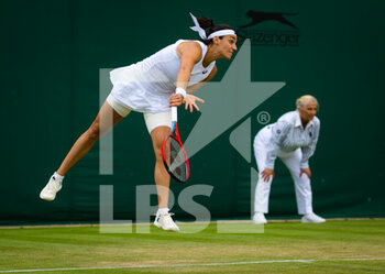 2022-07-01 - Caroline Garcia of France in action against Shuai Zhang of China during the third round of the 2022 Wimbledon Championships, Grand Slam tennis tournament on July 1, 2022 at All England Lawn Tennis Club in Wimbledon near London, England - TENNIS - WIMBLEDON 2022 - INTERNATIONALS - TENNIS