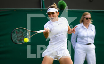 2022-07-02 - Simona Halep of Romania in action against Magdalena Frech of Poland during the third round of the 2022 Wimbledon Championships, Grand Slam tennis tournament on July 2, 2022 at All England Lawn Tennis Club in Wimbledon near London, England - TENNIS - WIMBLEDON 2022 - INTERNATIONALS - TENNIS
