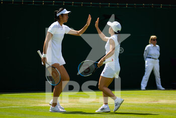 2022-07-03 - Hao-Ching Chan of Chinese Taipeh & Shuko Aoyama of Japan in action during the third round of doubles at the 2022 Wimbledon Championships, Grand Slam tennis tournament on July 3, 2022 at All England Lawn Tennis Club in Wimbledon near London, England - TENNIS - WIMBLEDON 2022 - INTERNATIONALS - TENNIS