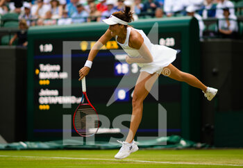 2022-07-03 - Tatjana Maria of Germany in action against Jelena Ostapenko of Latvia during the fourth round of the 2022 Wimbledon Championships, Grand Slam tennis tournament on July 3, 2022 at All England Lawn Tennis Club in Wimbledon near London, England - TENNIS - WIMBLEDON 2022 - INTERNATIONALS - TENNIS