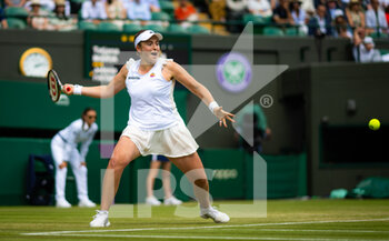 2022-07-03 - Jelena Ostapenko of Latvia in action against Tatjana Maria of Germany during the fourth round of the 2022 Wimbledon Championships, Grand Slam tennis tournament on July 3, 2022 at All England Lawn Tennis Club in Wimbledon near London, England - TENNIS - WIMBLEDON 2022 - INTERNATIONALS - TENNIS