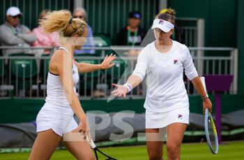 2022-07-03 - Barbora Krejcikova of the Czech Republic & Katerina Siniakova of the Czech Republic in action during the third round of doubles at the 2022 Wimbledon Championships, Grand Slam tennis tournament on July 3, 2022 at All England Lawn Tennis Club in Wimbledon near London, England - TENNIS - WIMBLEDON 2022 - INTERNATIONALS - TENNIS
