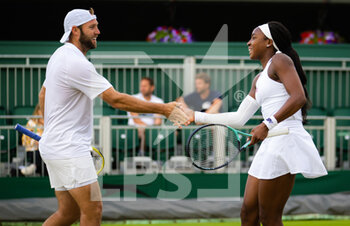 2022-07-03 - Coco Gauff of the United States & Jack Sock of the United States in action during the second round of mixed doubles at the 2022 Wimbledon Championships, Grand Slam tennis tournament on July 3, 2022 at All England Lawn Tennis Club in Wimbledon near London, England - TENNIS - WIMBLEDON 2022 - INTERNATIONALS - TENNIS