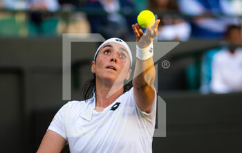 2022-07-03 - Ons Jabeur of Tunisia in action against Elise Mertens of Belgium during the fourth round of the 2022 Wimbledon Championships, Grand Slam tennis tournament on July 3, 2022 at All England Lawn Tennis Club in Wimbledon near London, England - TENNIS - WIMBLEDON 2022 - INTERNATIONALS - TENNIS