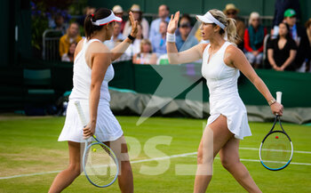 2022-07-04 - Alexa Guarachi of Chile & Andreja Klepac of Slovenia in action during the third round of doubles at the 2022 Wimbledon Championships, Grand Slam tennis tournament on July 4, 2022 at All England Lawn Tennis Club in Wimbledon near London, England - TENNIS - WIMBLEDON 2022 - INTERNATIONALS - TENNIS