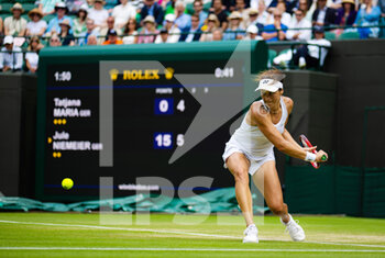 2022-07-05 - Tatjana Maria of Germany in action against Jule Niemeier of Germany during the quarter-final of the 2022 Wimbledon Championships, Grand Slam tennis tournament on July 5, 2022 at All England Lawn Tennis Club in Wimbledon near London, England - TENNIS - WIMBLEDON 2022 - INTERNATIONALS - TENNIS
