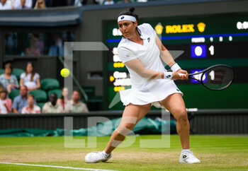 2022-07-05 - Ons Jabeur of Tunisia in action against Marie Bouzkova of the Czech Republic during the quarter-final of the 2022 Wimbledon Championships, Grand Slam tennis tournament on July 5, 2022 at All England Lawn Tennis Club in Wimbledon near London, England - TENNIS - WIMBLEDON 2022 - INTERNATIONALS - TENNIS