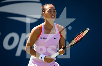 2022-08-30 - Qinwen Zheng of China in action against Jelena Ostapenko of Latvia during the first round of the US Open 2022, Grand Slam tennis tournament on August 30, 2022 at USTA National Tennis Center in New York, United States - TENNIS - US OPEN 2022 - WEEK 1 - INTERNATIONALS - TENNIS