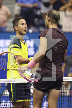 2022-08-30 - Rafael Nadal of Spain shakes hands with Rinky
Hijikata of Australia (left) after his victory during day 2 of the US Open 2022, 4th Grand Slam tennis tournament of the season on August 30, 2022 at USTA National Tennis Center in New York, United States - TENNIS - US OPEN 2022 - WEEK 1 - INTERNATIONALS - TENNIS