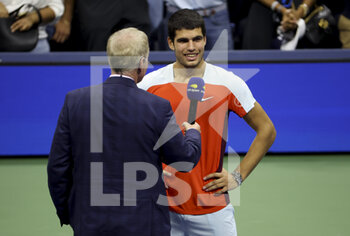 09/09/2022 - Carlos Alcaraz of Spain interviewed by Patrick McEnroe after his semifinal victory against Frances Tiafoe of USA during day 12 of the US Open 2022, 4th Grand Slam tennis tournament of the season on September 9, 2022 at USTA National Tennis Center in New York, United States - TENNIS - US OPEN 2022 - WEEK 2 - INTERNAZIONALI - TENNIS