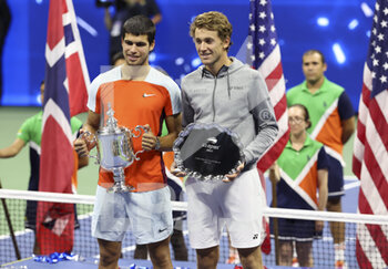 11/09/2022 - Winner Carlos Alcaraz of Spain, finalist Casper Ruud of Norway during the men's final trophy ceremony on day 14 of the US Open 2022, 4th Grand Slam tennis tournament of the season on September 11, 2022 at USTA National Tennis Center in New York, United States - TENNIS - US OPEN 2022 - WEEK 2 - INTERNAZIONALI - TENNIS