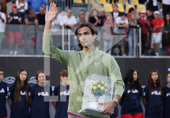 2022-10-23 - Lorenzo Musetti of Italy with the trophy after wins the final of ATP Naples against Matteo Berrettini of Italy  - ATP 250 NAPLES FINAL - INTERNATIONALS - TENNIS