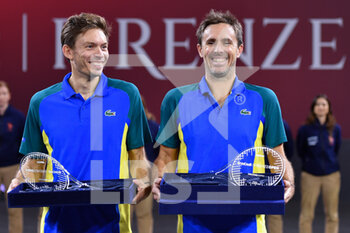 2022-10-16 - Nicolas Mahut and Edouard Roger-Vasselin pose with trophies - UNICREDIT FIRENZE OPEN - DOUBLES FINAL - INTERNATIONALS - TENNIS