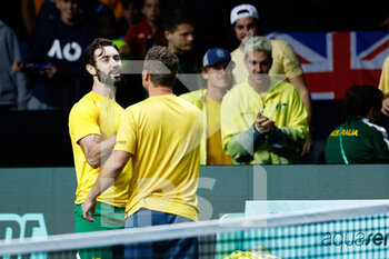 22/11/2022 - Jordan Thompson of Australia celebrates the victory with captain Lleyton Hewitt during the Davis Cup Finals 2022, Quarter-Finals round, between Australia and The Netherlands on november 22, 2022 at Palacio de Deportes Martin Carpena pavilion in Malaga, Spain - TENNIS - DAVIS CUP FINALS 2022 - AUSTRALIA V THE NETHERLANDS - INTERNAZIONALI - TENNIS