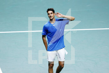 2022-11-24 - Lorenzo Sonego of Italy celebrates the victory against Frances Tiafoe of United States during the first tennis match from Davis Cup Finals 2022, Quarter-Finals round, played between Italy and United States on november 24, 2022 at Palacio de Deportes Martin Carpena pavilion in Malaga, Spain - TENNIS - DAVIS CUP FINALS 2022 - ITALY V UNITED STATES - INTERNATIONALS - TENNIS