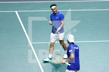 24/11/2022 - Simone Bolelli and Fabio Fognini of Italy play doubles against Tommy Paul and Jack Sock of United States during the third doubles tennis match from Davis Cup Finals 2022, Quarter-Finals round, played between Italy and United States on november 24, 2022 at Palacio de Deportes Martin Carpena pavilion in Malaga, Spain - TENNIS - DAVIS CUP FINALS 2022 - ITALY V UNITED STATES - INTERNAZIONALI - TENNIS