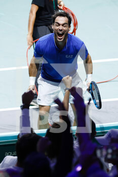 24/11/2022 - Fabio Fognini of Italy plays doubles with Simone Bolelli and celebrates the victory against Tommy Paul and Jack Sock of United States during the third doubles tennis match from Davis Cup Finals 2022, Quarter-Finals round, played between Italy and United States on november 24, 2022 at Palacio de Deportes Martin Carpena pavilion in Malaga, Spain - TENNIS - DAVIS CUP FINALS 2022 - ITALY V UNITED STATES - INTERNAZIONALI - TENNIS