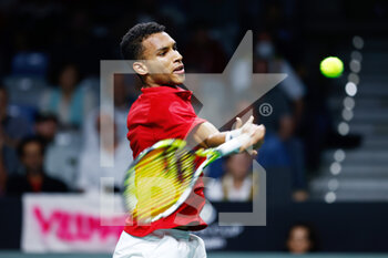 24/11/2022 - Felix Auger-Aliassime of Canada in action against Oscar Otte of Germany during the second tennis match from Davis Cup Finals 2022, Quarter-Finals round, played between Germany and Canada on november 24, 2022 at Palacio de Deportes Martin Carpena pavilion in Malaga, Spain - TENNIS - DAVIS CUP FINALS 2022 - GERMANY V CANADA - INTERNAZIONALI - TENNIS
