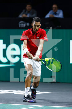24/11/2022 - Felix Auger-Aliassime of Canada in action against Oscar Otte of Germany during the second tennis match from Davis Cup Finals 2022, Quarter-Finals round, played between Germany and Canada on november 24, 2022 at Palacio de Deportes Martin Carpena pavilion in Malaga, Spain - TENNIS - DAVIS CUP FINALS 2022 - GERMANY V CANADA - INTERNAZIONALI - TENNIS