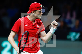 2022-11-26 - Denis Shapovalov of Canada in action against Lorenzo Sonego of Italy during the first tennis match from Davis Cup Finals 2022, Semi-Finals round, played between Italy and Canada on november 26, 2022 at Palacio de Deportes Martin Carpena pavilion in Malaga, Spain - TENNIS - DAVIS CUP FINALS 2022 - ITALY V CANADA - INTERNATIONALS - TENNIS