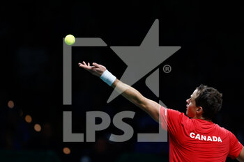 2022-11-26 - Vasek Popisil of Canada plays doubles with Felix Auger-Aliassime against Matteo Berretini and Fabio Fognini of Italy during the third doubles tennis match from Davis Cup Finals 2022, Semi-Finals round, played between Italy and Canada on november 26, 2022 at Palacio de Deportes Martin Carpena pavilion in Malaga, Spain - TENNIS - DAVIS CUP FINALS 2022 - ITALY V CANADA - INTERNATIONALS - TENNIS
