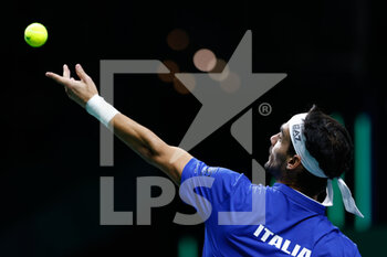 2022-11-26 - Fabio Fognini of Italy plays doubles with Matteo Berretini against Felix Auger-Aliassime and Vasek Popisil of Canada during the third doubles tennis match from Davis Cup Finals 2022, Semi-Finals round, played between Italy and Canada on november 26, 2022 at Palacio de Deportes Martin Carpena pavilion in Malaga, Spain - TENNIS - DAVIS CUP FINALS 2022 - ITALY V CANADA - INTERNATIONALS - TENNIS