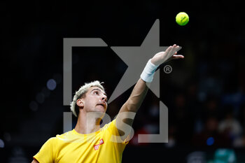 27/11/2022 - Thanasi Kokkinakis of Australia in action against Denis Shapovalov of Canada during the first tennis match from Davis Cup Finals 2022, Final, between Canada and Australia on november 27, 2022 at Palacio de Deportes Martin Carpena pavilion in Malaga, Spain - TENNIS - DAVIS CUP FINALS 2022 - CANADA V AUSTRALIA - INTERNAZIONALI - TENNIS