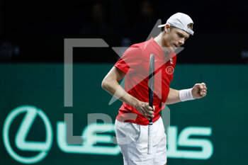 27/11/2022 - Denis Shapovalov of Canada in action against Thanasi Kokkinakis of Australia during the first tennis match from Davis Cup Finals 2022, Final, between Canada and Australia on november 27, 2022 at Palacio de Deportes Martin Carpena pavilion in Malaga, Spain - TENNIS - DAVIS CUP FINALS 2022 - CANADA V AUSTRALIA - INTERNAZIONALI - TENNIS