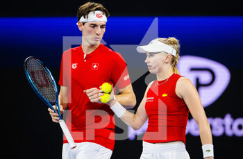 2022-12-30 - Jil Teichmann of Switzerland & Marc-Andrea Huesler in action during the mixed-doubles match at the 2023 United Cup Brisbane tennis tournament on December 30, 2022 in Brisbane, Australia - TENNIS - UNITED CUP 2023 - INTERNATIONALS - TENNIS
