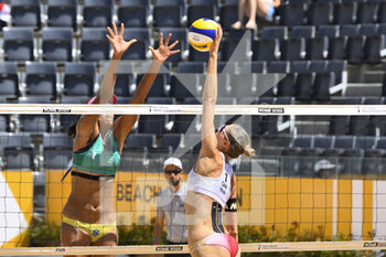 2022-06-17 - Ana Patrícia (BRA) and Sarah Pavan (CAN)  during the Beach Volleyball World Championships quarterfinals on 17th June 2022 at the Foro Italico in Rome, Italy. - BEACH VOLLEYBALL WORLD CHAMPIONSHIPS (QUARTERFINALS) - BEACH VOLLEY - VOLLEYBALL