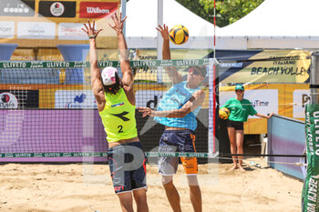 2022-07-29 - Attack by Paolo Ingrosso on the wall of Tommaso Casellato - CAMPIONATO ITALIANO ASSOLUTO GOLD (DAY1) - BEACH VOLLEY - VOLLEYBALL