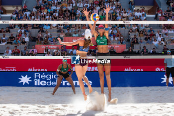 2022-06-19 - Kristen Nuss of USA and Ana Patricia of Brazil fight for the ball during the Beach Volleyball , Paris Beach Pro Tour on October 1, 2023 at Roland Garros, Paris, France - BEACH VOLLEYBALL - PARIS BEACH PRO TOUR - BEACH VOLLEY - VOLLEYBALL