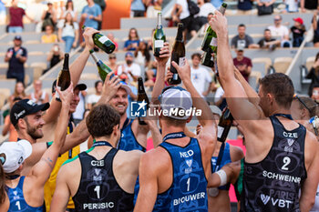 2022-06-19 - The winners celebrate the victory after the Beach Volleyball , Paris Beach Pro Tour on October 1, 2023 at Roland Garros, Paris, France - BEACH VOLLEYBALL - PARIS BEACH PRO TOUR - BEACH VOLLEY - VOLLEYBALL