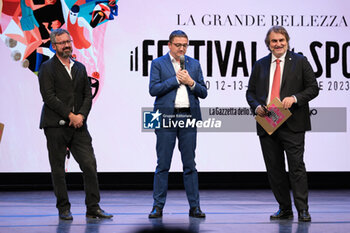 2023-10-12 - (L to R) (L to R) Franco Ianeselli major of Trento city, Maurizio Fugatti president of Trento province and Pierluigi Pardo during the opening ceremony of the 6th edition of Festival dello Sport on October 12, 2023, Trento, Italy. - FESTIVAL DELLO SPORT - EVENTS - OTHER SPORTS