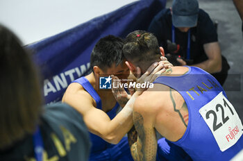 2023-09-30 - Loremzo Casali and Nicola Bartolini crying after the qualification to the Olympic Games (ITA) - 52ND ARTISTIC GYMNASTICS WORLD CHAMPIONSHIPS - MAG QUALIFICATIONS - GYMNASTICS - OTHER SPORTS
