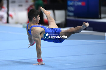 2023-10-03 - Yumin Abbadini (ITA) floor - 52ND ARTISTIC GYMNASTICS WORLD CHAMPIONSHIPS - MEN'S TEAM FINAL - GYMNASTICS - OTHER SPORTS