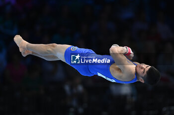 2023-10-03 - Yumin Abbadini (ITA) floor - 52ND ARTISTIC GYMNASTICS WORLD CHAMPIONSHIPS - MEN'S TEAM FINAL - GYMNASTICS - OTHER SPORTS