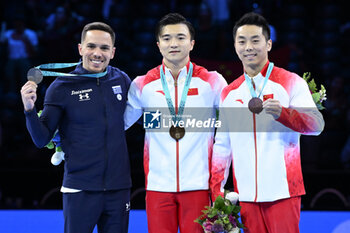 2023-10-07 - Still Rings Podium: Gold Medal LIU Yang (CHN, Silver Medal PETROUNIAS Eleftherios (GRE) Bronze Medal YOU Hao (CHN) - 52ND ARTISTIC GYMNASTICS WORLD CHAMPIONSHIPS - APPARATUS FINALS DAY 1 - GYMNASTICS - OTHER SPORTS
