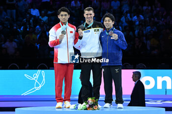 2023-10-08 - Parallel Bars Medal Ceremony: GOLD DAUSER Lukas SILVER SHI Cong BRONZE SUGIMOTO Kaito - 52ND ARTISTIC GYMNASTICS WORLD CHAMPIONSHIPS - APPARATUS FINALS DAY 2 - GYMNASTICS - OTHER SPORTS