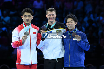 2023-10-08 - Parallel Bars Medal Ceremony: GOLD DAUSER Lukas SILVER SHI Cong BRONZE SUGIMOTO Kaito - 52ND ARTISTIC GYMNASTICS WORLD CHAMPIONSHIPS - APPARATUS FINALS DAY 2 - GYMNASTICS - OTHER SPORTS