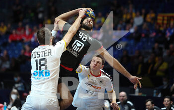 27/01/2023 - Hassan Kaddah of Egypt and Julian Koster of Germany during the IHF Men's World Championship 2023, placement matches 5-8, Handball match between Germany and Egypt on January 27, 2023 at Tele2 Arena in Stockholm, Sweden - HANDBALL - IHF MEN'S WORLD CHAMPIONSHIP 2023 - GERMANY V EGYPT - PALLAMANO - ALTRO