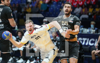 27/01/2023 - Philipp Weber of Germany, Mohsen Mahmoud of Egypt during the IHF Men's World Championship 2023, placement matches 5-8, Handball match between Germany and Egypt on January 27, 2023 at Tele2 Arena in Stockholm, Sweden - HANDBALL - IHF MEN'S WORLD CHAMPIONSHIP 2023 - GERMANY V EGYPT - PALLAMANO - ALTRO