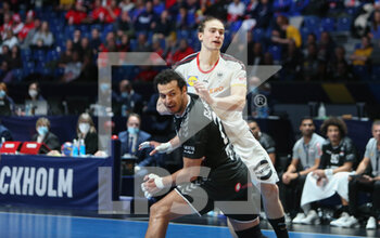 27/01/2023 - Juri Knorr of Germany, Ibrahim Elmasry of Egypt during the IHF Men's World Championship 2023, placement matches 5-8, Handball match between Germany and Egypt on January 27, 2023 at Tele2 Arena in Stockholm, Sweden - HANDBALL - IHF MEN'S WORLD CHAMPIONSHIP 2023 - GERMANY V EGYPT - PALLAMANO - ALTRO