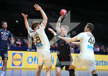 29/01/2023 - Magnus Gullerud of Norway and Lukas Stutzke, Christoph Steinert of Germany during the IHF Men's World Championship 2023, Placement matches 5-6, Handball match between Germany and Norway on January 29, 2023 at Tele2 Arena in Stockholm, Sweden - HANDBALL - IHF MEN'S WORLD CHAMPIONSHIP 2023 - GERMANY V NORWAY - PALLAMANO - ALTRO