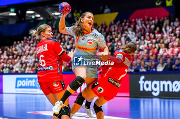 2023-12-12 - Larissa Nusser of the Netherlands is challenged by Maren Nyland Aardahl of Norway and Stine Ruscetta Skogrand of Norway during the 26th IHF Women's World Championship, Quarter Finals Handball match between Netherlands and Norway on December 12, 2023 at Trondheim Spektrum in Trondheim, Norway - HANDBALL - IHF WOMEN'S WORLD CHAMPIONSHIP 2023 - NETHERLANDS V NORWAY - HANDBALL - OTHER SPORTS