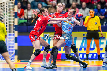 2023-12-12 - Yvette Broch of the Netherlands is challenged by Kar Brattset Dale of Norway and Maren Nyland Aardahl of Norway during the 26th IHF Women's World Championship, Quarter Finals Handball match between Netherlands and Norway on December 12, 2023 at Trondheim Spektrum in Trondheim, Norway - HANDBALL - IHF WOMEN'S WORLD CHAMPIONSHIP 2023 - NETHERLANDS V NORWAY - HANDBALL - OTHER SPORTS
