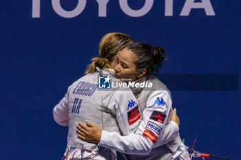 2023-07-26 - Volpi Alice (ITA) hugs Errigo Arianna (ITA) - FIE SENIOR FENCING WORLD CHAMPIONSHIPS - DAY5 - FENCING - OTHER SPORTS